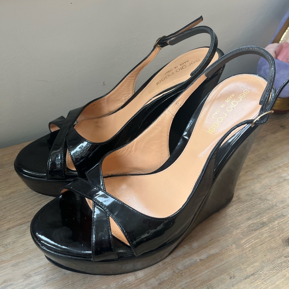 Size 6 black leather pumps by Rossi